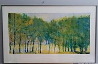 Full view of the framed print showing the colorful tree grove landscape.