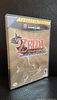 Front view of original game case showing The Legend of Zelda Wind Waker cover art and Nintendo GameCube branding