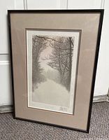 Full view of the framed signed and numbered print titled 'Snow Path' showing the artwork and framing details.