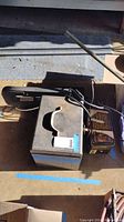 Silver soldering station in metal case with attached power cord
