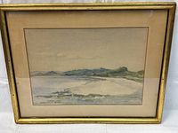 Front view of framed watercolor landscape by James Wylie with visible signature and gold frame