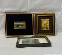 Group photo showing all three framed paintings displayed together, illustrating their size comparison and framing styles.