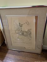 Framed drawing front view leaning against wall