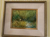 Front view of the framed abstract landscape painting, showing artwork with green-yellow textured brushwork and outer gold ornate frame with fabric matting.