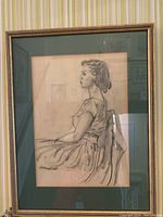 Front view of framed William Winter drawing of seated woman, showcasing framing, signature, and artwork detail.
