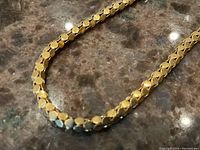 Close-up detail of faceted hexagonal links on countertop