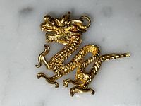 Front angle showing dragon head and upper body detail