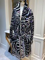 Full front view of black silk robe on mannequin showing overall length and abstract chain pattern