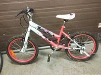 Right side view of 5 Speed Girls Super Cycle Fly Girl bike with white and pink frame and red rims.