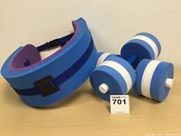Photo showing aqua fitness waist band and foam water dumbbells together