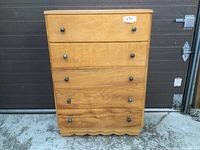Front view of solid birch chest of drawers with four drawers, label '674' on top drawer, showing wood grain and knob details