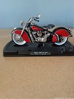 Front left side view showing body paint and base label