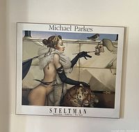 Framed Michael Parkes print showing a surreal image with a woman, tiger, and bird, with artist and gallery information on border.