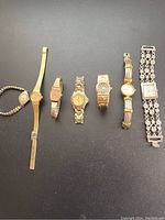 Overview of all seven watches lined up side by side