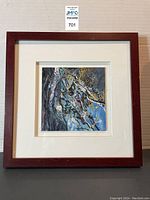 Framed abstract art print showing full front view