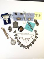 All items laid out on white background showing full lot