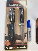 Rapala Classic Hunters knife in original unopened packaging, black sheath included, SKU NOR 38