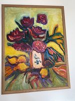 Framed floral painting on board showing vibrant flowers in vase with yellow background, wood frame visible.