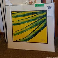Framed watercolour artwork with prominent green brush strokes on yellow, signed E. Matiss in lower right corner.