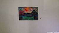 Full view of the abstract landscape painting on canvas hung on a wall, showing vivid colors and shapes.