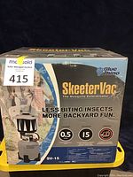 Front side of SkeeterVac box showing product image, Blue Rhino branding, and key features such as 0.5 acre coverage and cordless design.