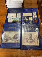 Four vintage Canadian history books from the 'Record of Our History' series laid out on a wooden surface, showing their blue dust jackets with titles and historical images.