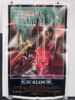 Full view of vintage Excalibur movie poster showing design and wear