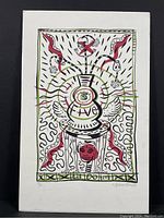 Front view of the signed and numbered "Five" print showing the colorful abstract design with the number 5, face, wings, flowers, and skulls.