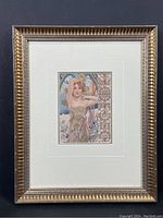 Full view of framed Art Nouveau print featuring a woman in floral dress.