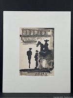 Front view of matted Picasso 'Toros and Toreros' black and white print showing abstract figures, shrink-wrapped