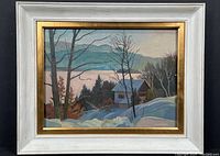 Full front view of framed painting showing winter landscape scene with cabin and mountains