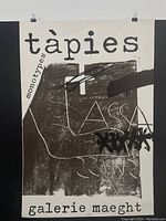 Full view of Tapies lithography poster, showing main abstract black and white graphic and text 'tapies','monotypes', and 'galerie maeght'.