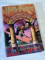 Front cover of the hardcover book showing the colorful illustrated dust jacket with the title and author name.