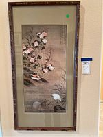 Full view of bamboo-style framed floral and bird print