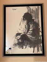 Full front view of large black-and-white framed painting showing the complete artwork and frame.