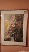 Full view of framed floral watercolor painting showing the entire artwork and frame.