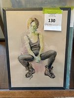 Front view of framed painting showing a seated woman in grey pants and boots, titled 'After Practice' by Helen Burford