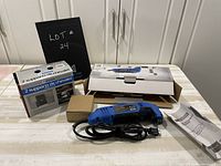 Full display of the Mastercraft multi-crafter kit in original packaging, the power tool, instruction manuals, and boxed saw horse brackets.