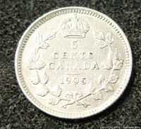 Reverse side of the 1905 Canada 5 cents coin showing denomination and wreath design