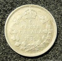 Obverse side of 1915 Canadian 5 cents coin with crown, denomination, country and date
