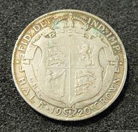 Reverse side showing crowned shield with Royal Arms and date 1920.