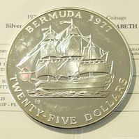 Obverse side of the coin showing sailing ship design with denomination and year.