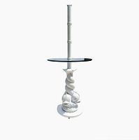 Full view of the vintage plaster floor lamp with koi fish sculptural base and round glass table top against a white background