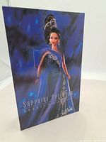 Front of the unopened Sapphire Splendor Barbie box showing artwork of the doll in a blue gown