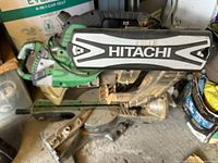 Top view of the Hitachi mitre saw handle with clear branding visible.