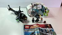 Full set showing helicopter, minifigures, and building