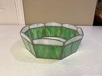 Full view of the octagonal stained glass planter bowl showing its shape and colors.