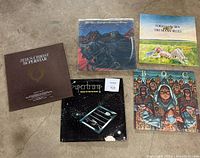 Overview photo showing five vinyl records from various artists: Jesus Christ Superstar, Blue Oyster Cult, The Moody Blues, Supertramp, and B.C. Robinson.