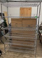 Full view of five-shelf chrome wire rack
