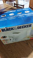 Box of Black & Decker deep fryer ProMaster Plus showing branding and product image.